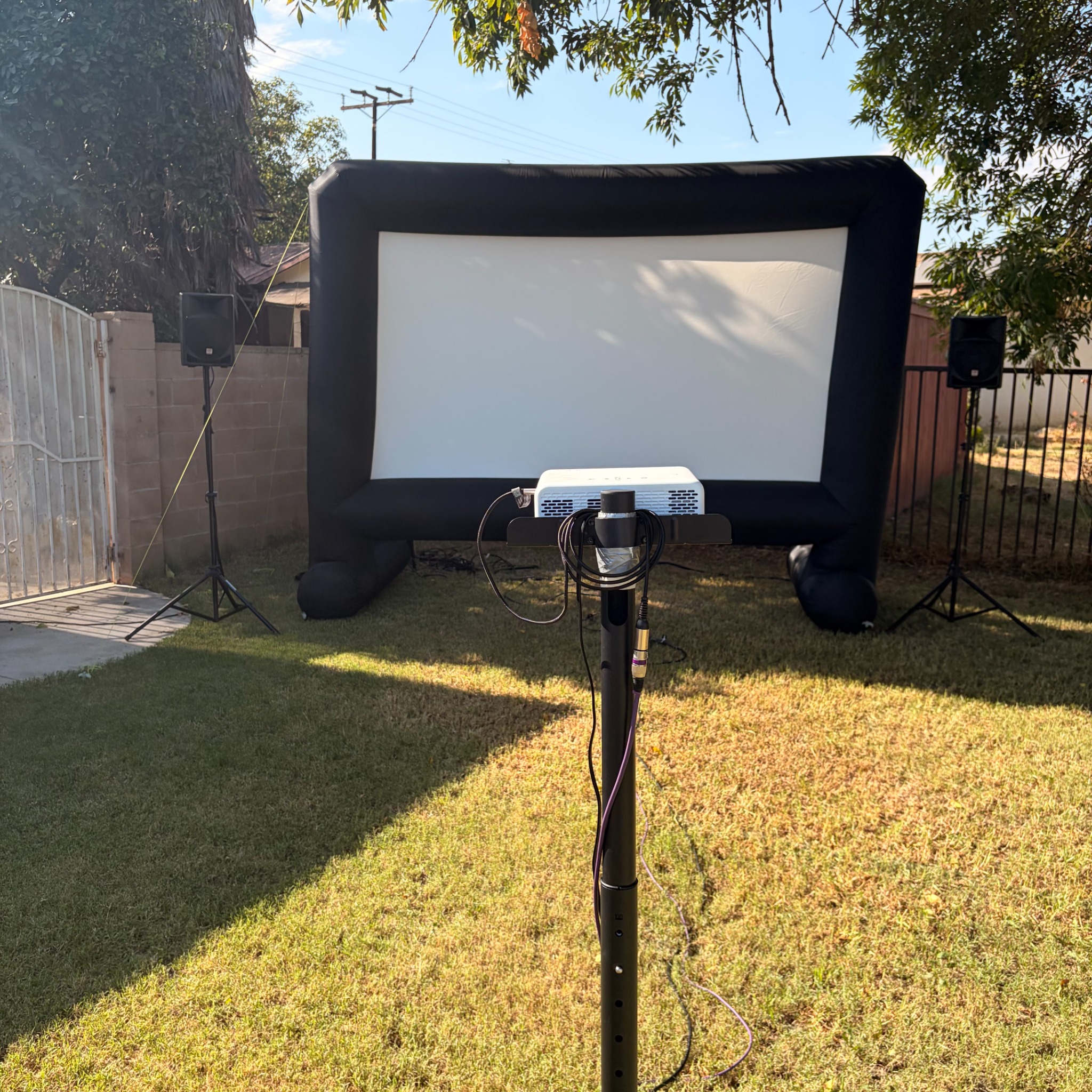 Palmwood Rentals inflatable movie screen and audio setup in Colton